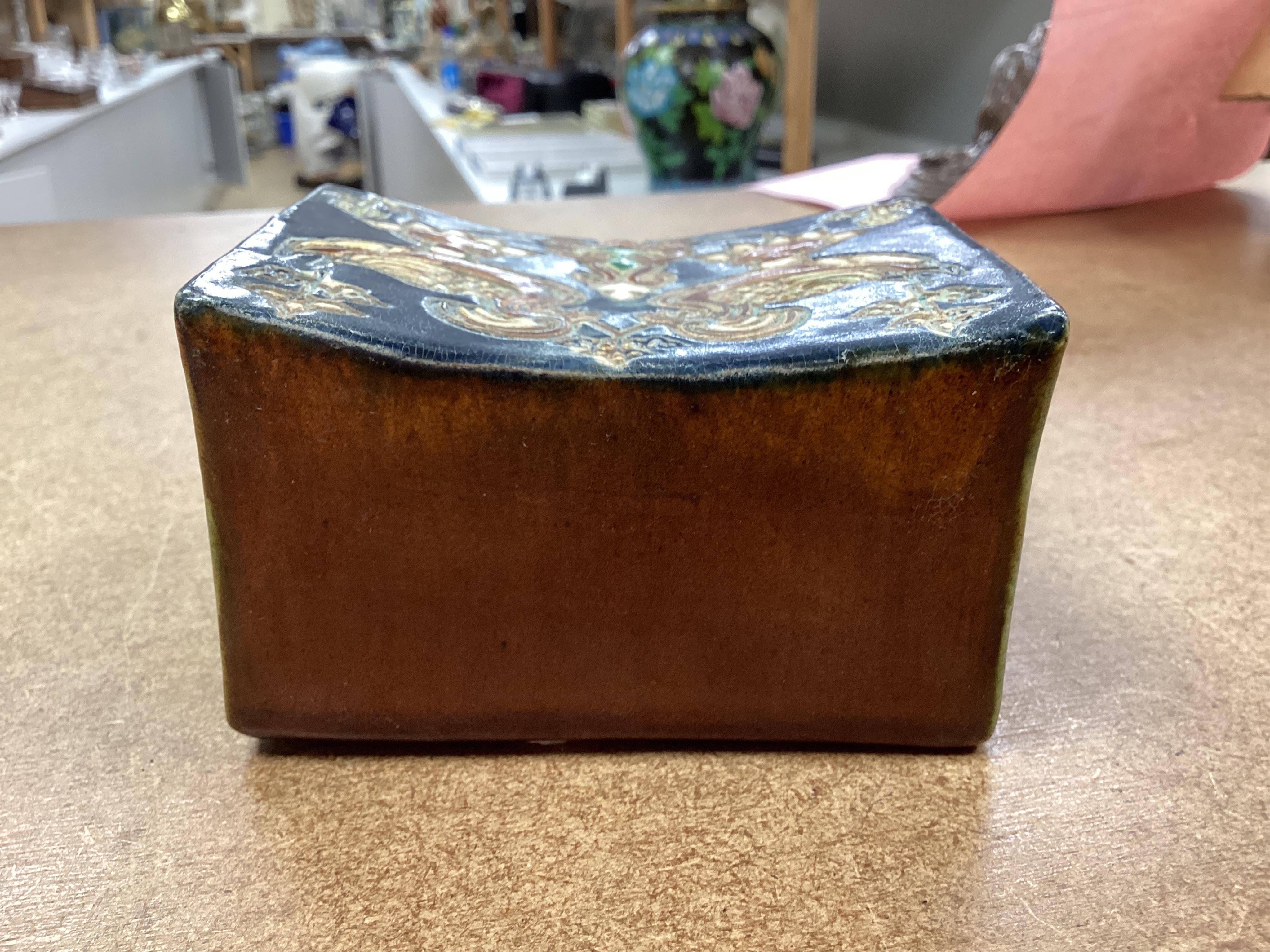 A Chinese stone ware arm rest, 10cm wide
